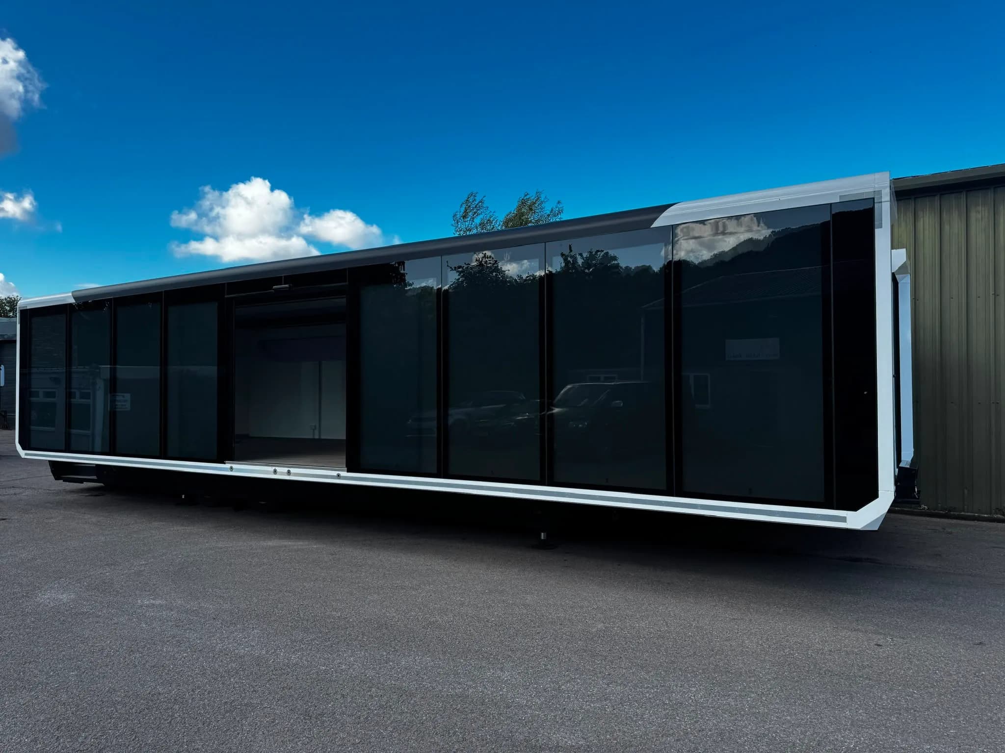 Glass-fronted Vatoris expandable trailer in its deployed configuration
