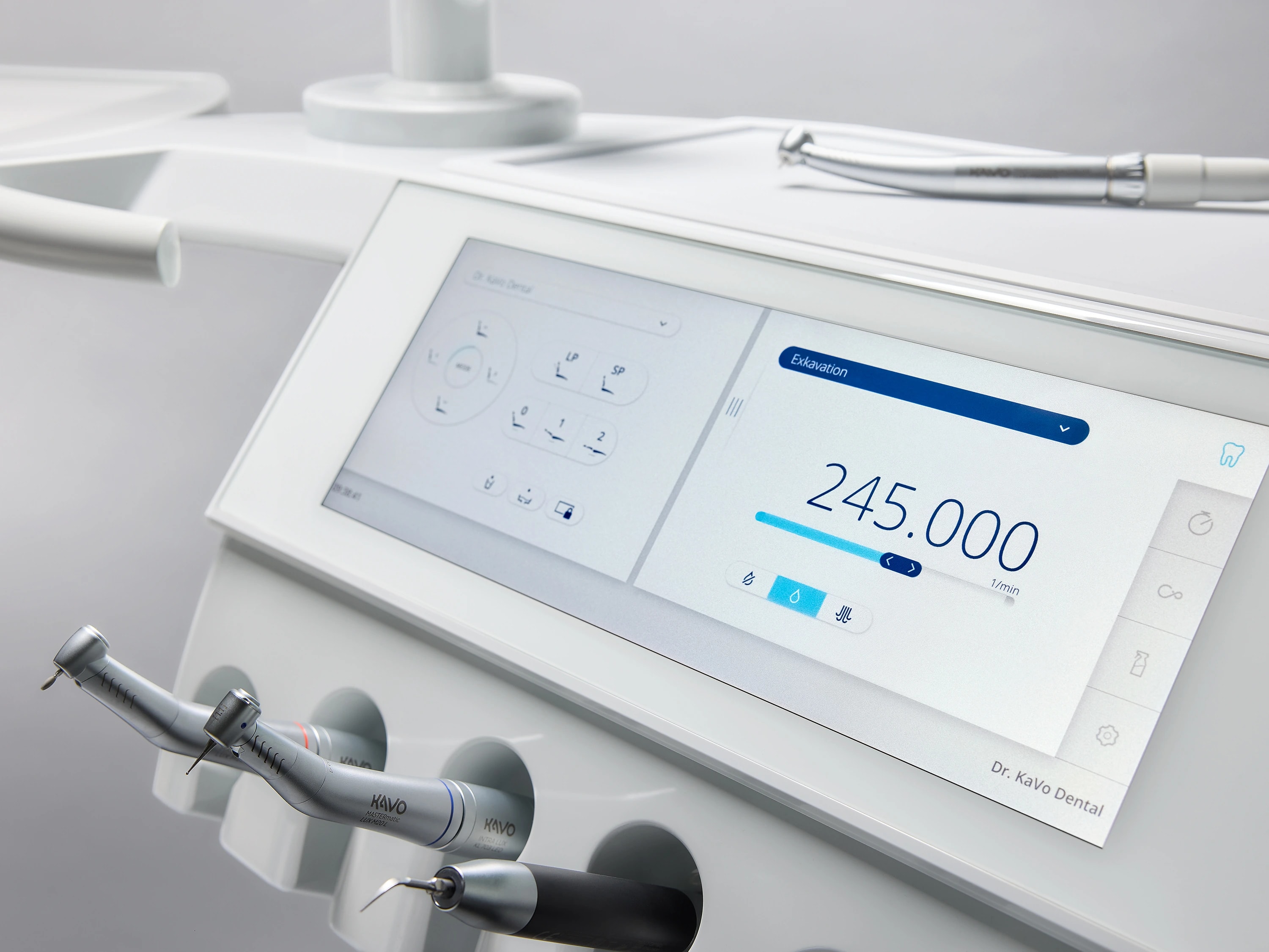 A close view of KaVo dental controls and mounted handpieces.