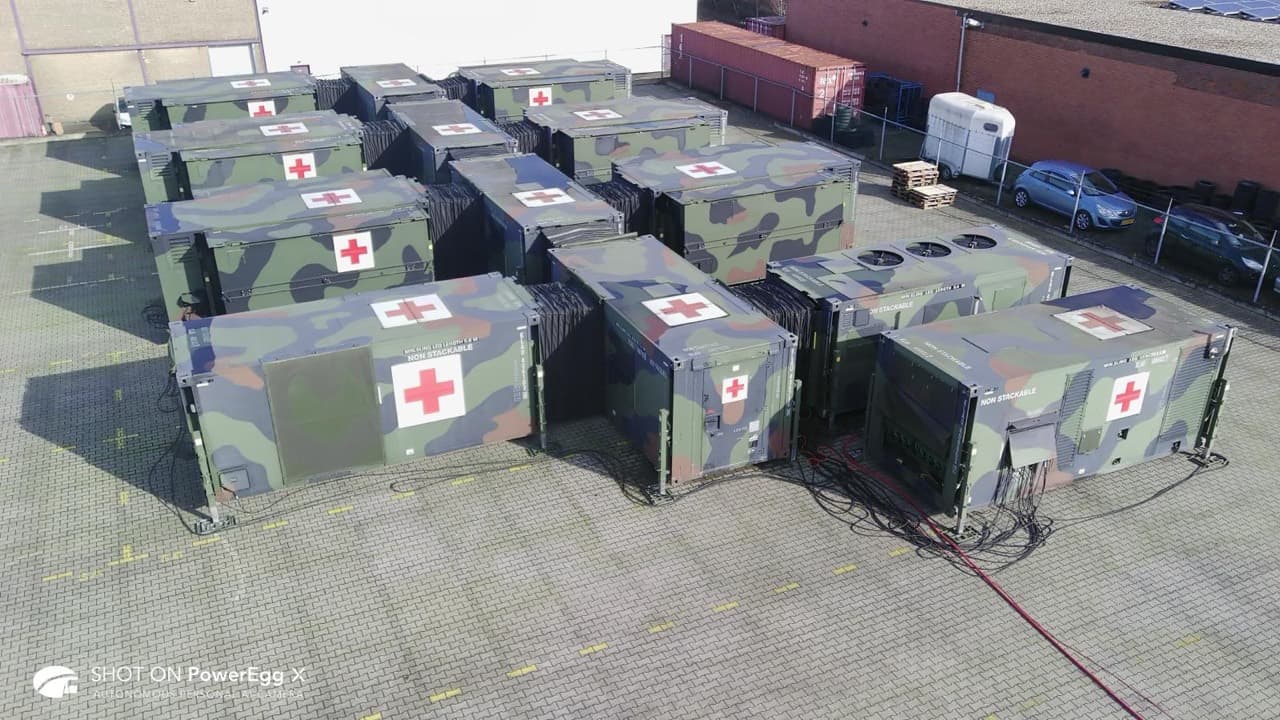 Connected hospital photographed from above, showing modules on both sides of its central corridor