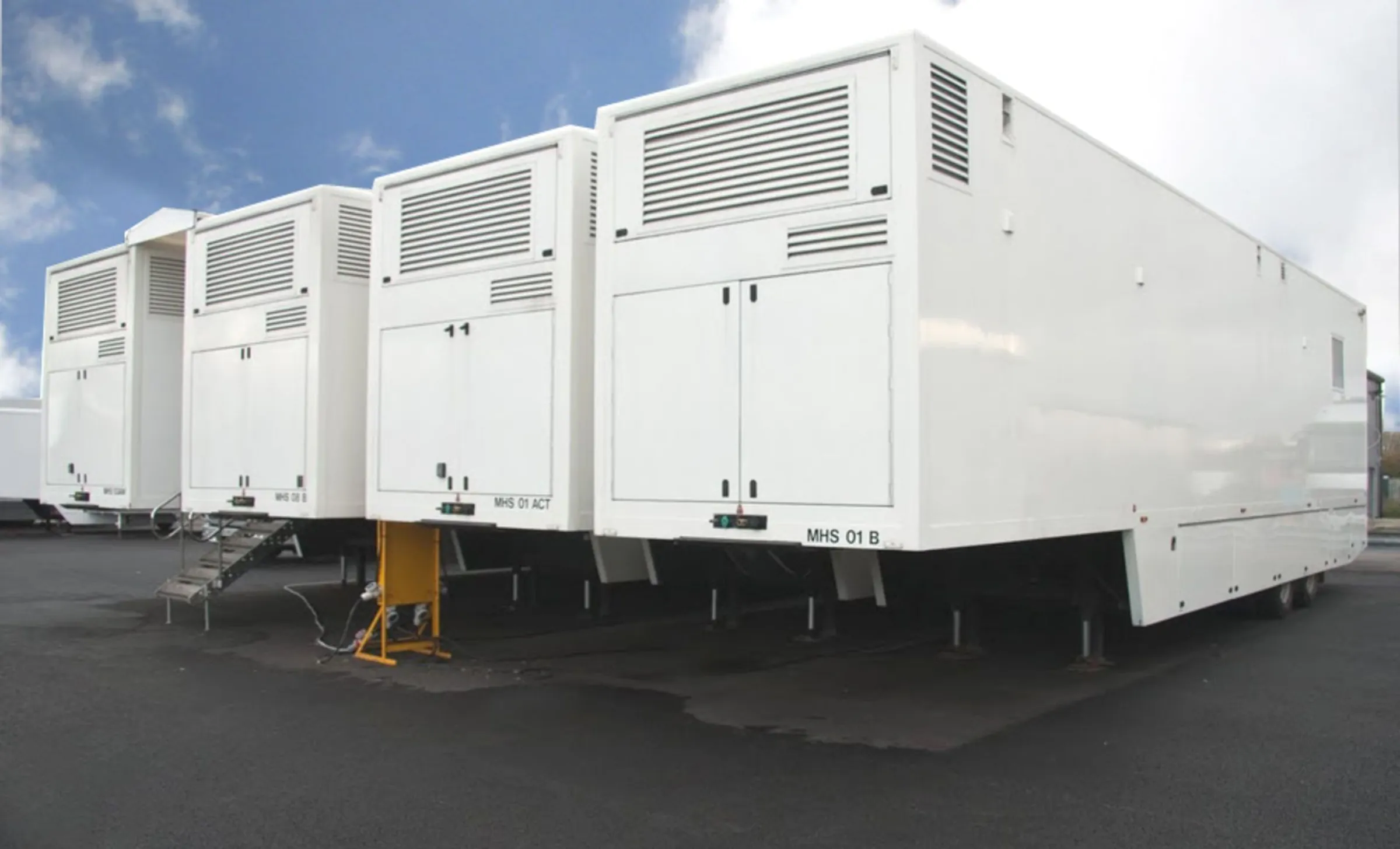 Quad outpatient trailers connected in a row