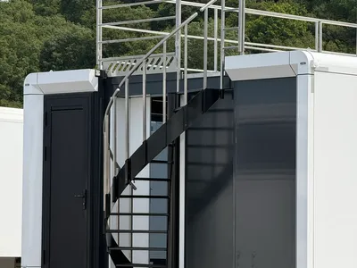 Expandable trailer optional staircase and rear entrance